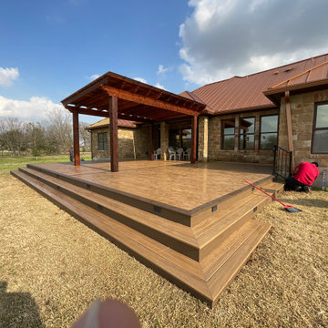 Cedar pergola and composite deck with lighting