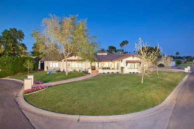 Inspiration for a transitional exterior home remodel in Phoenix
