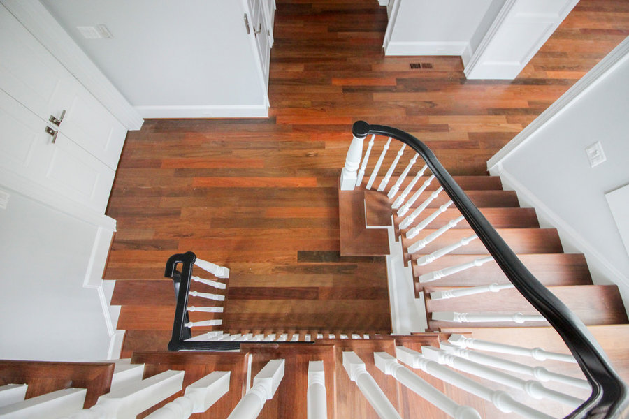 Powerful Impression by Floating Staircase in Suburban Foyer