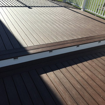 Trex Transcend decking, Picture frame, white trim, vinyl railings