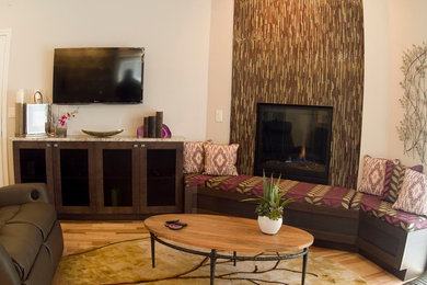 Tuscan family room photo in Denver
