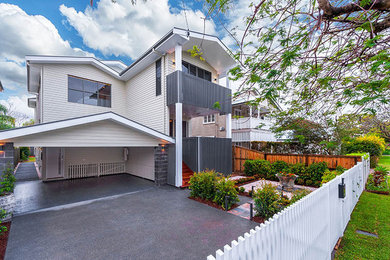 Photo of a two-storey white house exterior in Brisbane.