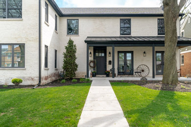 Inspiration for a transitional exterior home remodel in Chicago