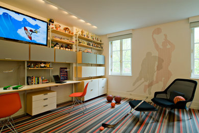 Example of a large trendy boy carpeted kids' room design in New York with multicolored walls