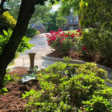 Mulching,pruning,sod, river rock, stepping stone installs