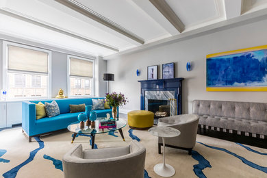 Inspiration for a transitional dark wood floor living room remodel in New York with gray walls and a standard fireplace