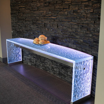 Glass table with LED lights in luxurious residential condo