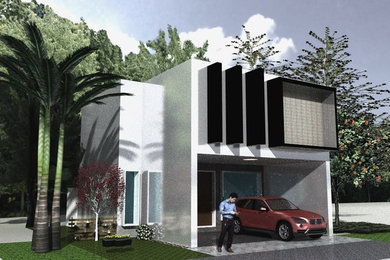 Small modern white one-story brick flat roof idea in Mexico City