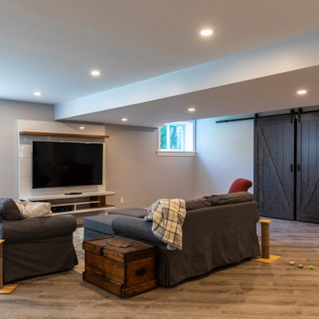 Basement with bedroom, hobby (train) room and gym