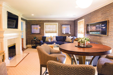 Example of a mid-sized transitional open concept family room design in New York with a bar, multicolored walls, a standard fireplace, a stone fireplace and a media wall