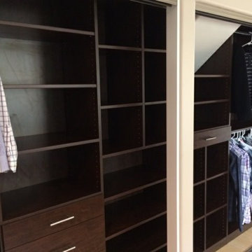 Dark wood his & hers reach-in closets