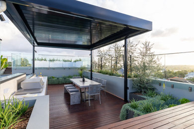 Small contemporary deck in Brisbane.