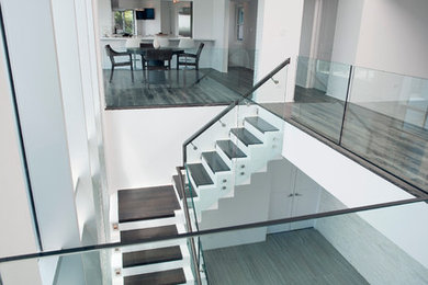 Example of a trendy staircase design in Other
