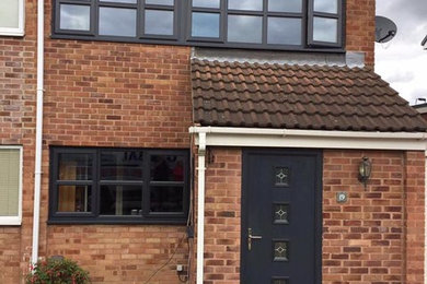 Before & After - Anthracite grey uPVC windows with Composite Door from Door-Stop