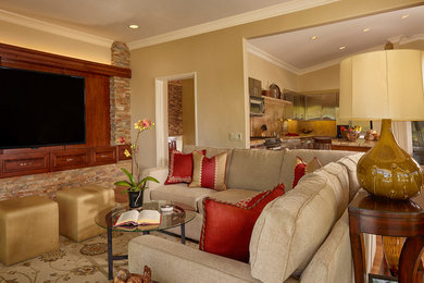 Living room - mid-sized traditional open concept porcelain tile living room idea in Los Angeles with beige walls and a media wall