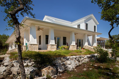Large country exterior home idea in Austin