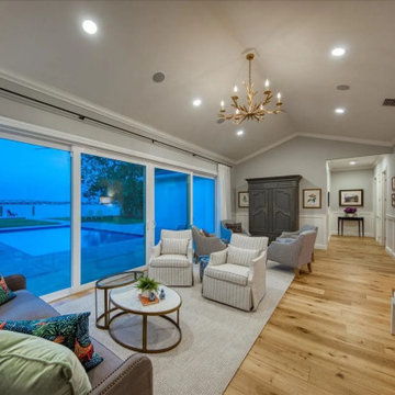Inviting Family Room with Expansive Glass and Serene Ambiance