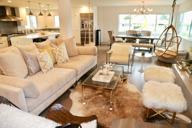 Living room - large contemporary open concept light wood floor and brown floor living room idea in Seattle with white walls, a standard fireplace, a stone fireplace and a wall-mounted tv