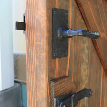 A View of the double driveway gate slightly opened