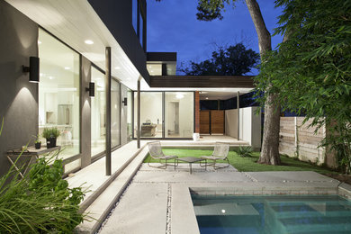 Inspiration for a transitional pool remodel in Austin