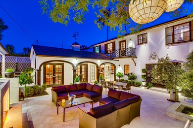 Inspiration for a huge transitional courtyard tile patio remodel in San Diego with a fire pit and no cover
