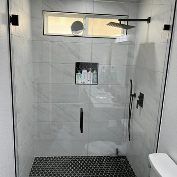 Bathroom with black hexagon tiles