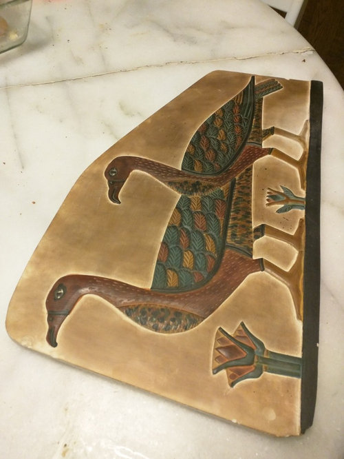 how to hang stone sculpture like this?