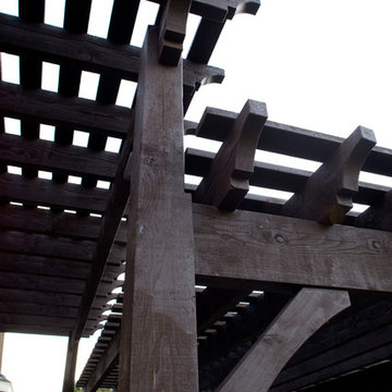 Timber Frame Tiered Pergolas, Deck, Ornamental Metal Railings