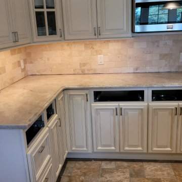 Victoria Falls & Ice Flakes countertops with stone farm sink