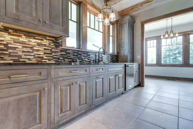 Example of an arts and crafts kitchen design in Milwaukee