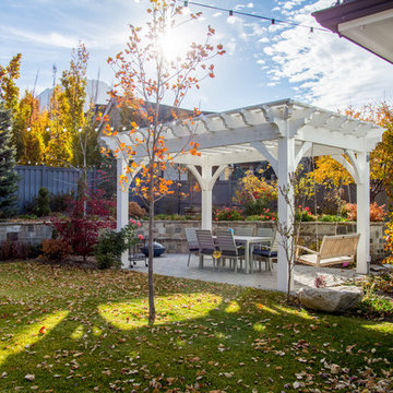 Posh Porte-cochère with Backyard Pergola & Bench Swing