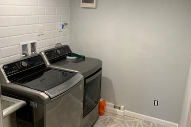 Inspiration for a modern laundry room remodel in Seattle