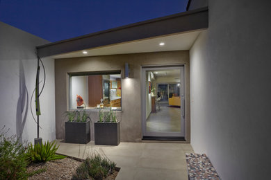 Mid-sized transitional home design photo in Phoenix
