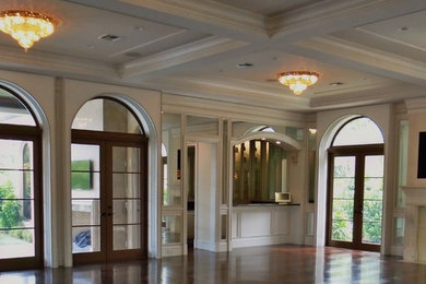 Living room - huge traditional formal and open concept dark wood floor living room idea in Miami with a standard fireplace, a stone fireplace and a wall-mounted tv