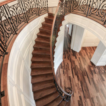 Project #74 | Circular Staircase with Hand-Forged Metal Panels
