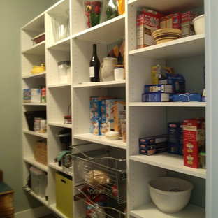 Large craftsman kitchen pantry designs - Kitchen pantry - large craftsman u-shaped slate floor kitchen pantry idea in Providence with open cabinets, white cabinets and an island