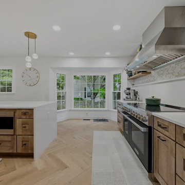 Warm Cherry Kitchen and Powder Room Remodel with Waterfall Island in Herndon, VA