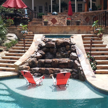outdoor kitchen and waterfall