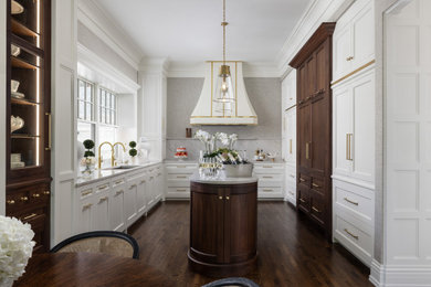 Example of a large classic u-shaped dark wood floor eat-in kitchen design in Other with a double-bowl sink, shaker cabinets, white cabinets, marble countertops, gray backsplash, paneled appliances, an island and gray countertops