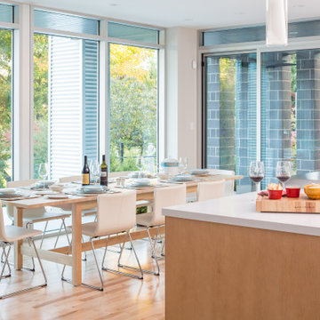 Open Concept Dining Room with Floor to Ceiling Windows