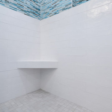 Built-in hideaway niche and a corner floating seat