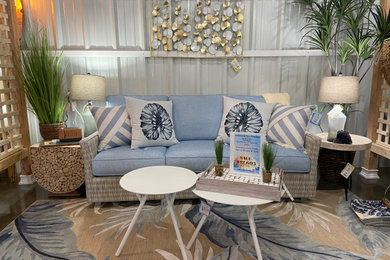 Beach style home design photo in Other