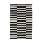 Navy and cream area rug