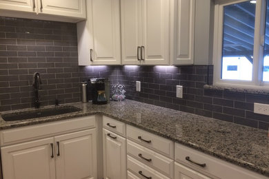 Kitchen - modern kitchen idea in Denver