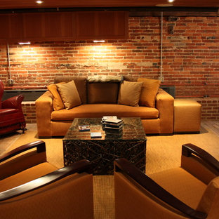 Large victorian enclosed home cinema in Other with red walls, brick flooring, a projector screen and brown floors.