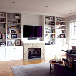 White-Painted Built-in around Fireplace and TV - Display And Wall Shelves 