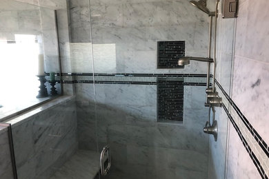 Inspiration for a large modern master white tile and marble tile marble floor and white floor bathroom remodel in Portland with white walls, a hinged shower door and gray countertops