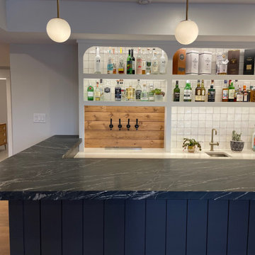 Finished Basement in Marshall Township With Custom Bar and Beer Tap