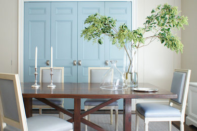 Inspiration for a timeless dark wood floor enclosed dining room remodel in New York with beige walls and no fireplace