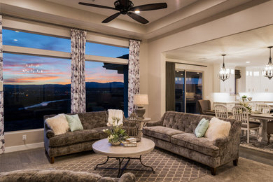 Inspiration for a transitional open concept carpeted living room remodel in Salt Lake City with beige walls, a standard fireplace, a tile fireplace and a wall-mounted tv
